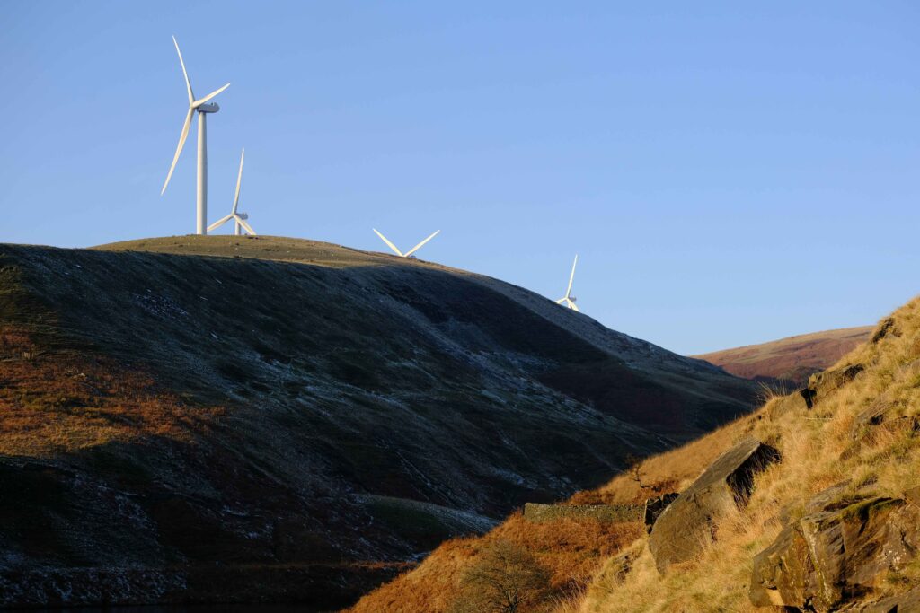 Rochdale Wind Farm, UK, a sustainable landscape with subtle elements hinting at the possibility of car recovery scenarios